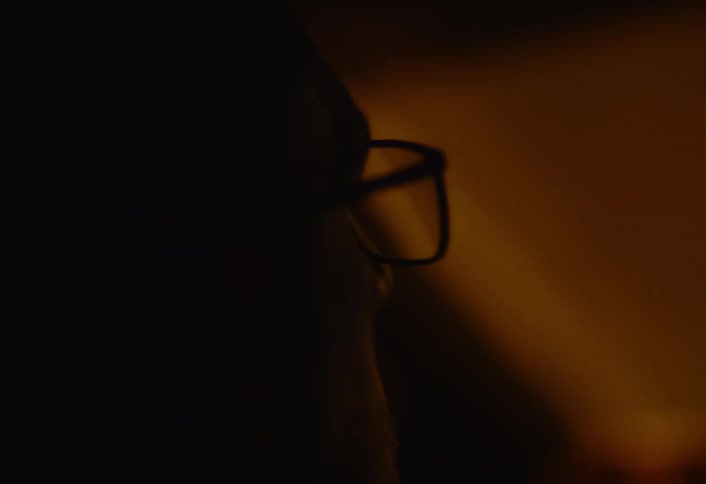 Man looks around while driving through a tunnel and into the open