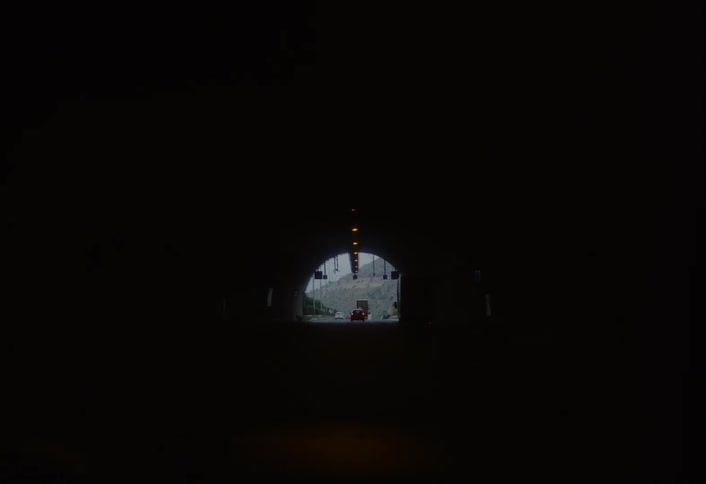 Traffic enters and exits the tunnel