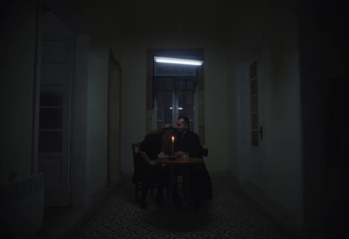 A man consoles a sad woman
