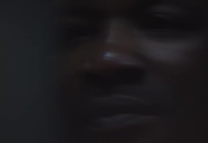 A mans face goes out of focus