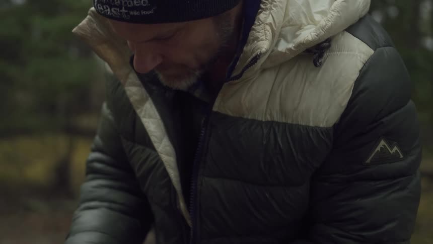 A footage of a man wearing a beanie