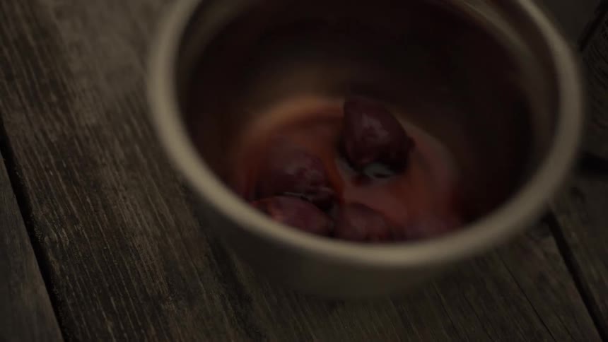 A bowl is stirred swirling around the food inside