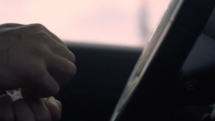 A footage of a person holding an object
