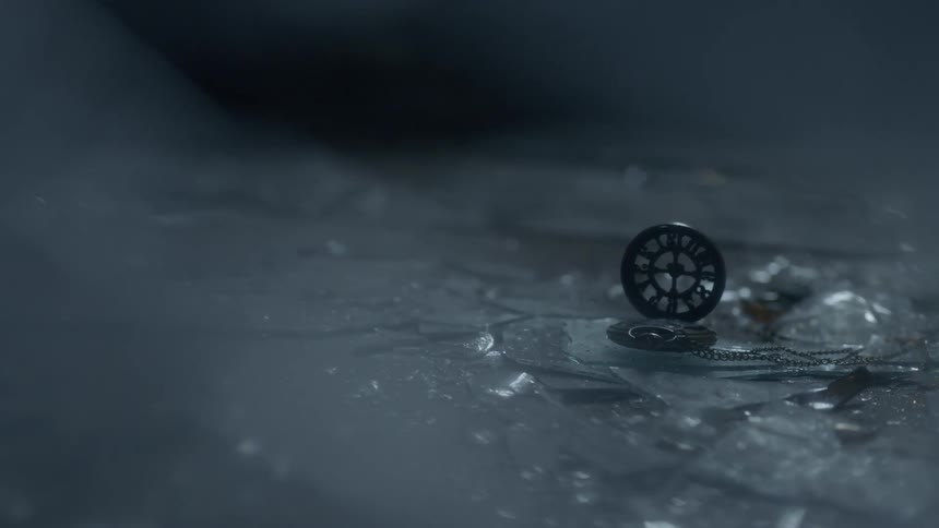 The ground is covered with glass and debris