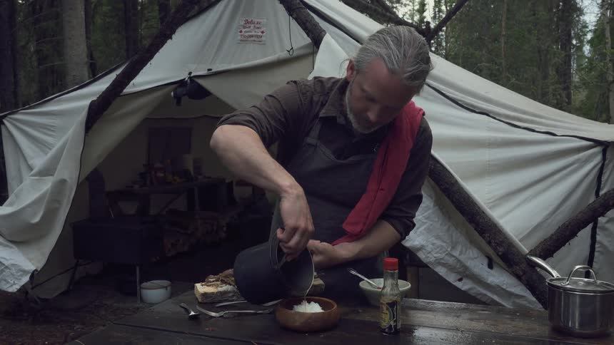 A footage of a man serving a meal
