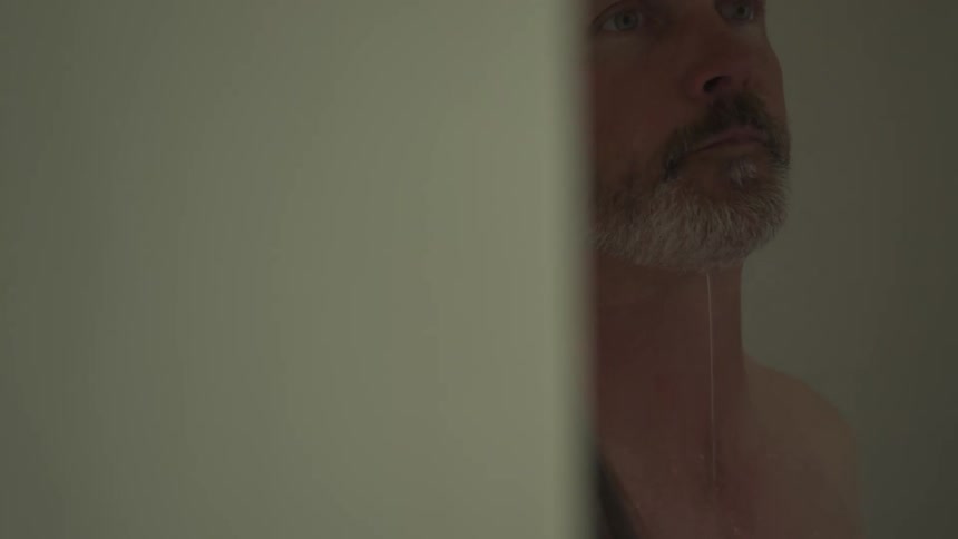 A footage of a man bathing