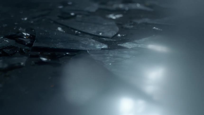 Pieces of glass are all over the ground