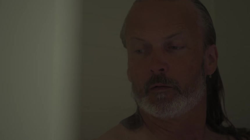 A footage of a man taking a shower