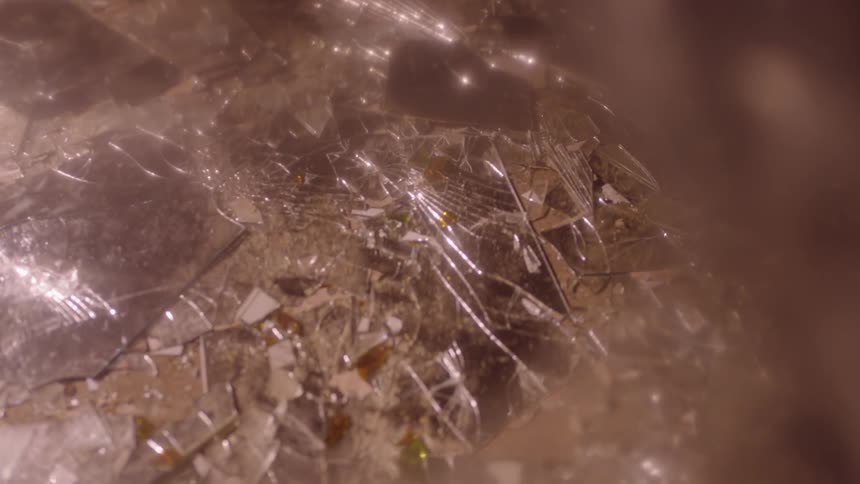 The ground has broken glass all over