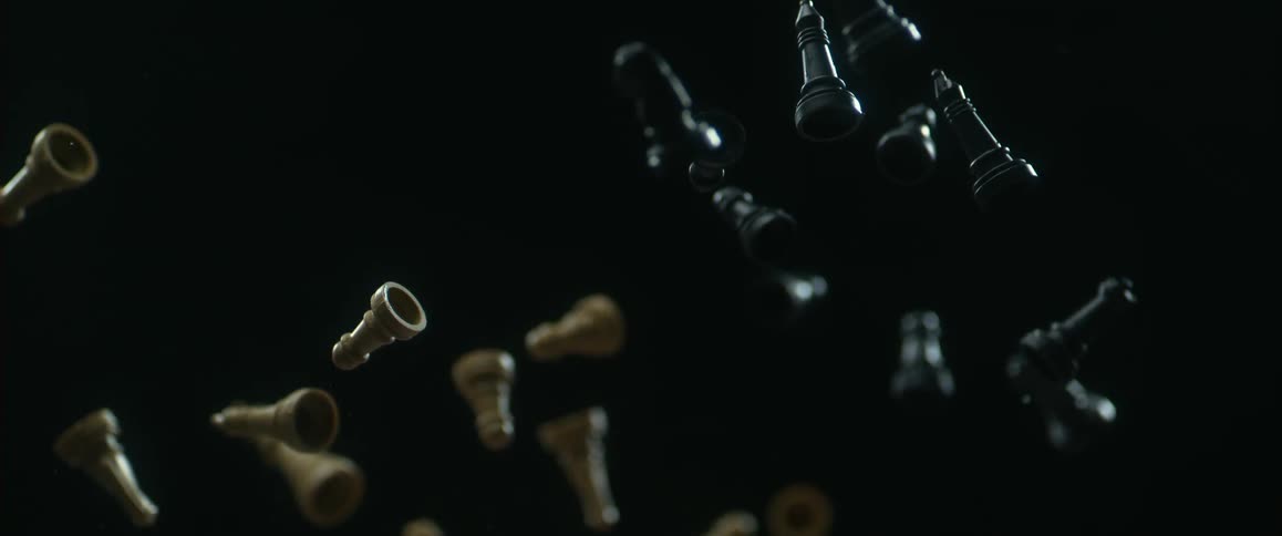 Chess pieces flying around