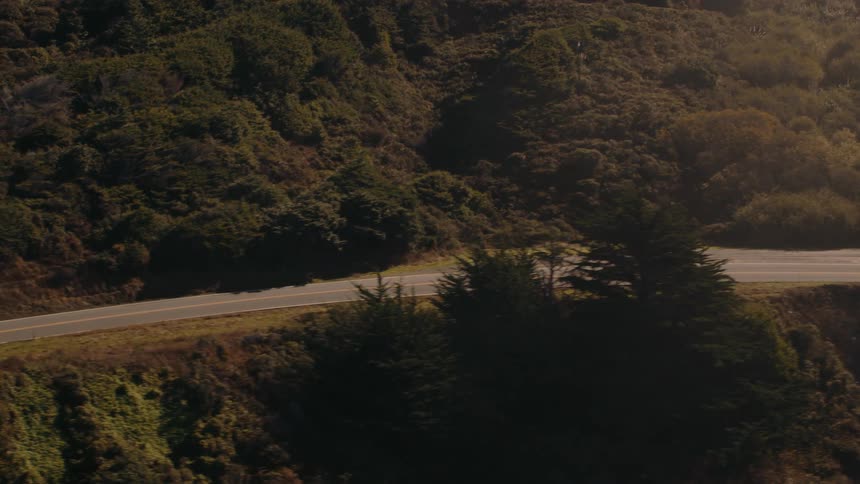 An aerial clip of a bike moving on a freeway