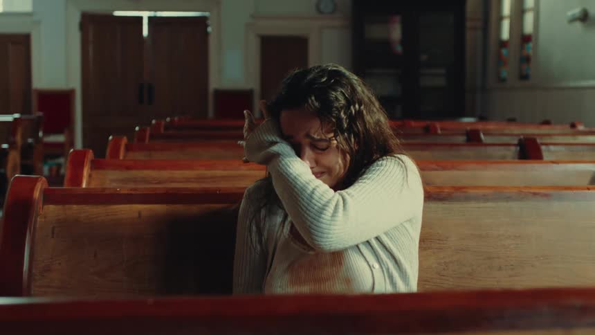 A footage of a sad lady crying