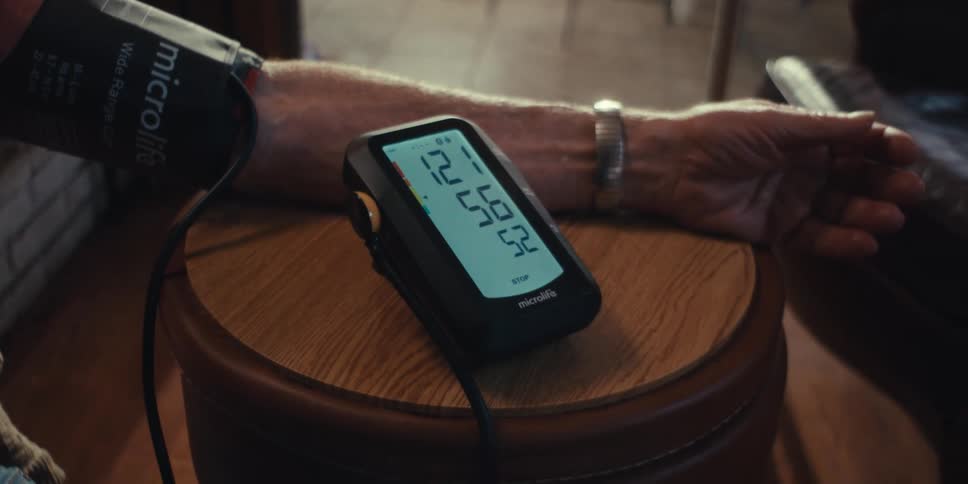 A man is taking his blood pressure