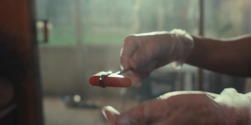 A man touches the medical tool