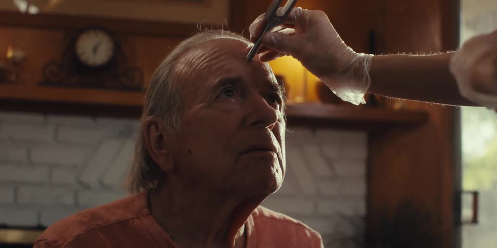 A man is receiving a medical test at home