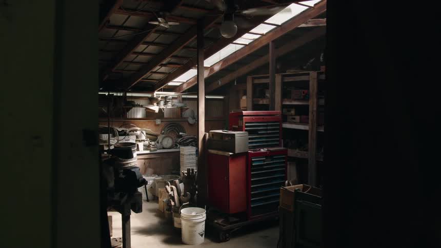 A ceiling fan spins in the shop