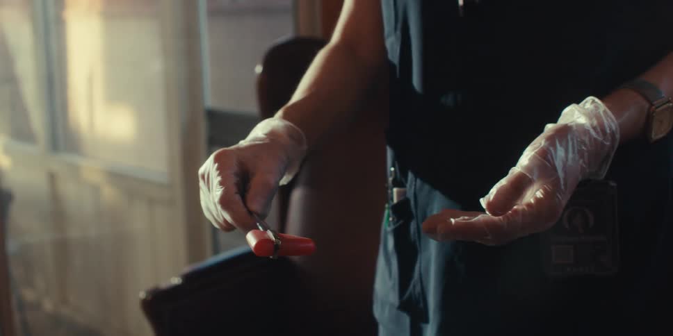 A footage of a person making an illustration with an object