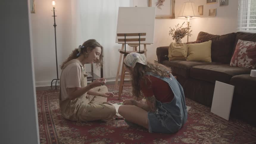 A footage of people playing cards indoor
