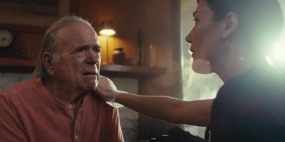 An elderly patient is talking with his doctor and is sad