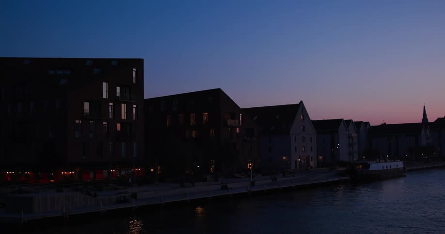 Several buildings line the waterfront