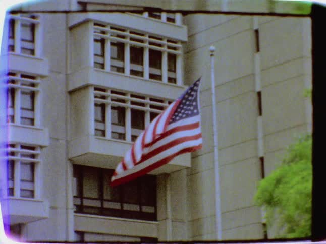 An american flag billows in the wind
