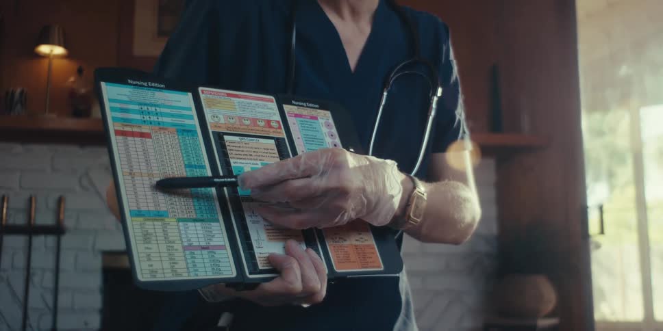 The nurse is explaining a brochure