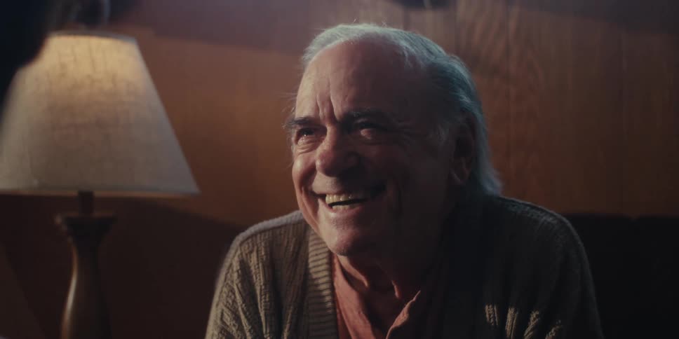 A footage of a man laughing