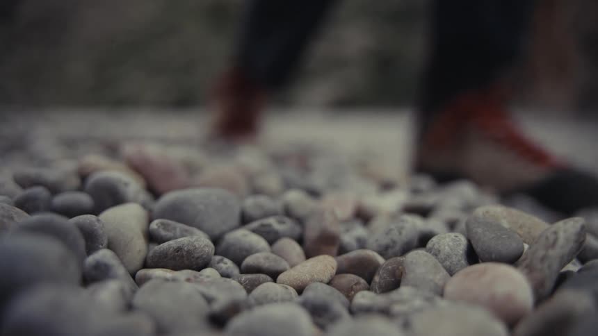 A rock is picked up