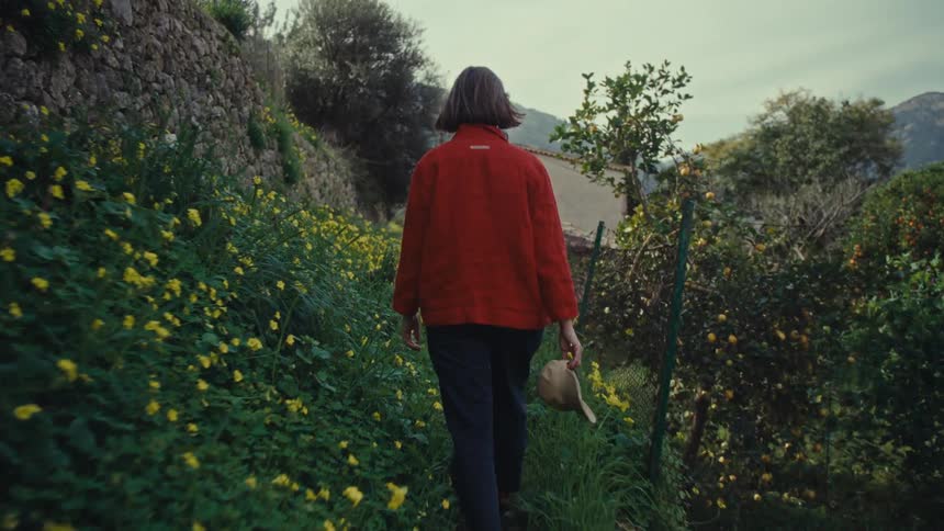 A woman takes a nature walk