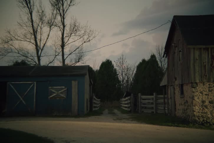 Wooden houses in a rural area on a cloudy day