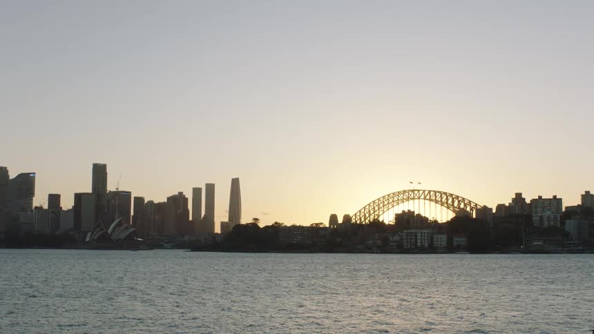 Landscape of a metropolis at the end of the afternoon by the sea