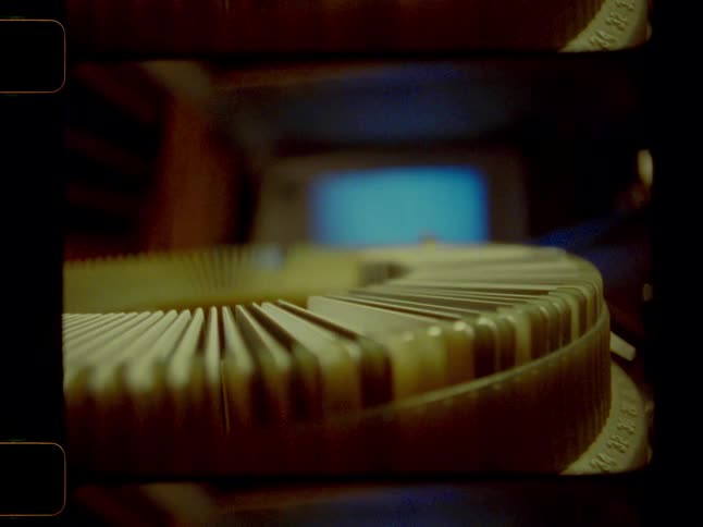 Rotating machine projects slides onto a small panel