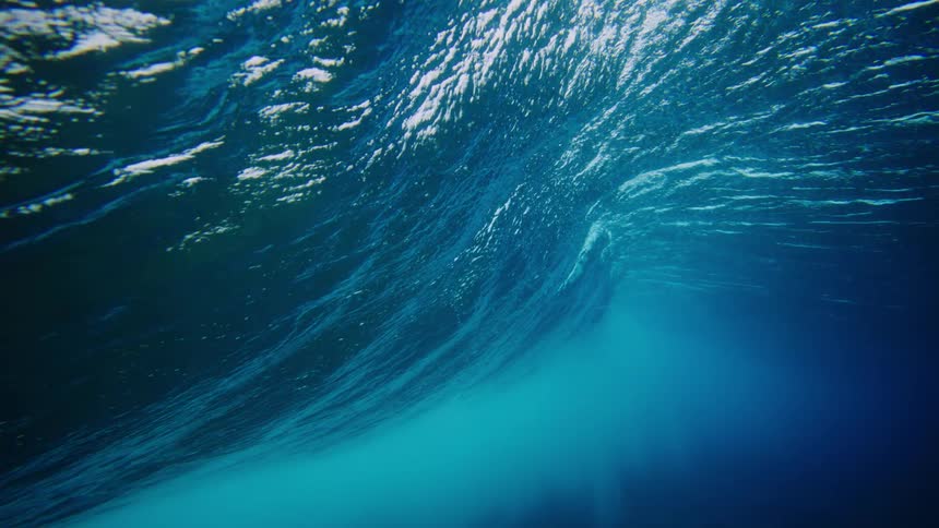 Submerged view of a wave passing by in the ocean