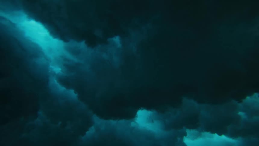 View of the ocean depths and a tubular wave breaking