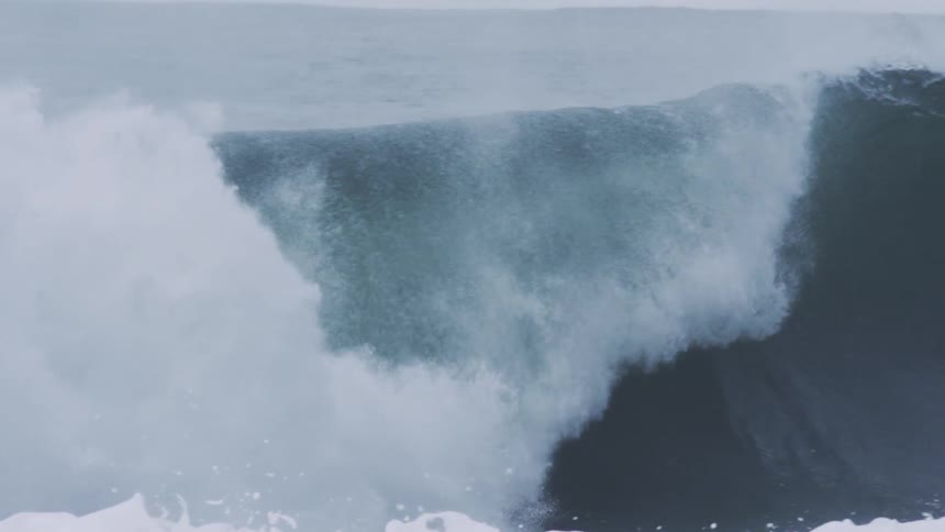 Moving view of a large tubular wave breaking