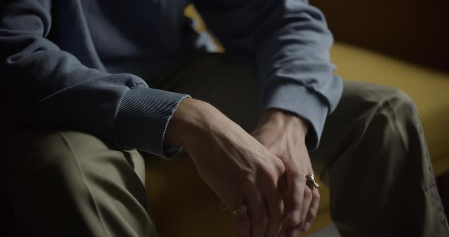 Close up of a mans hands with rings