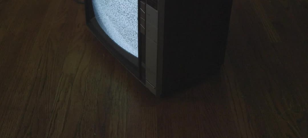 Tv flickering static on a hardwood floor