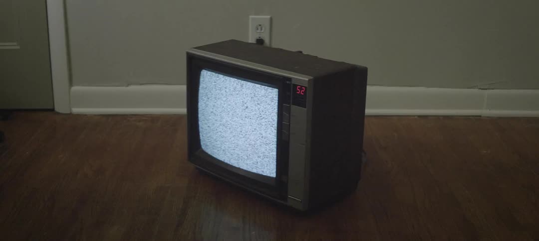Tv flickering static on a hardwood floor