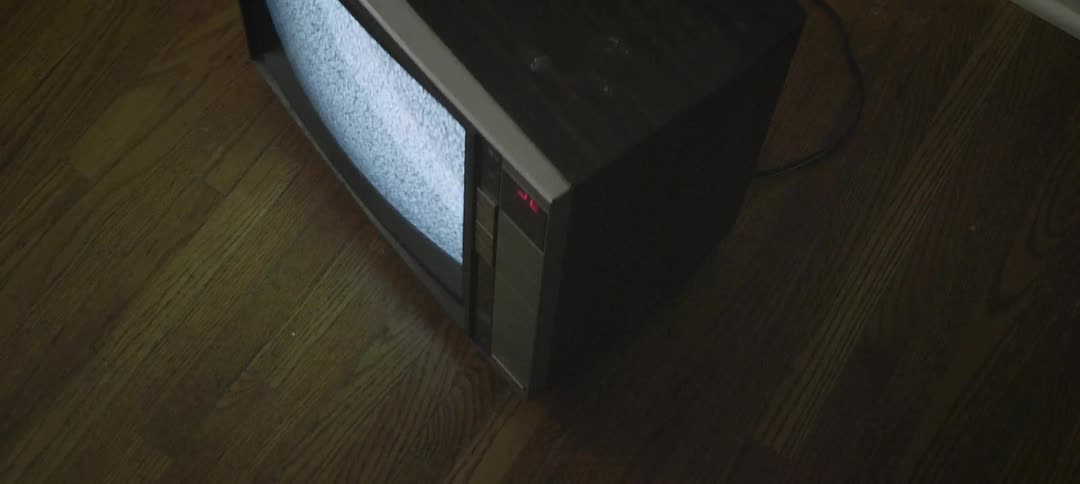 Tv flickering static on a hardwood floor