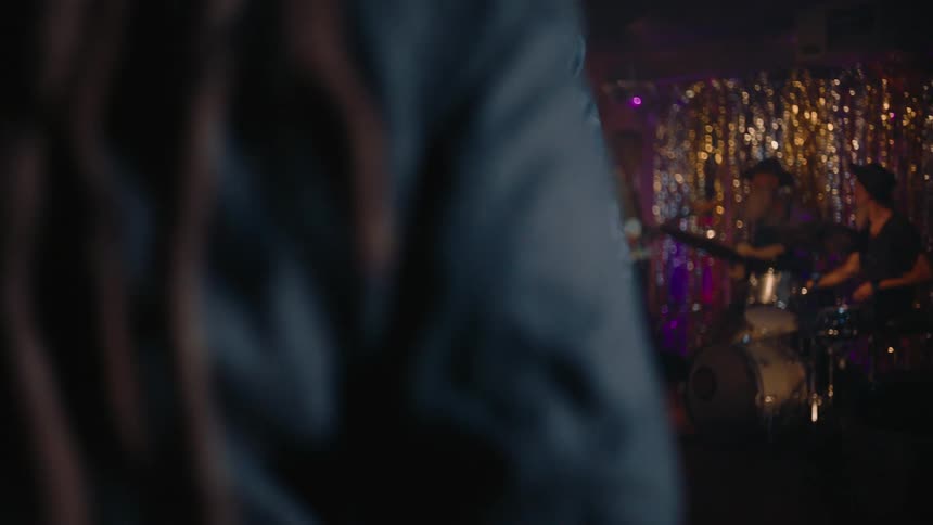 A band is performing in the club
