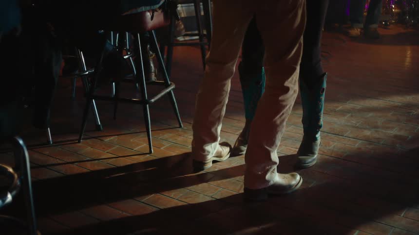 A footage of people dancing in the club