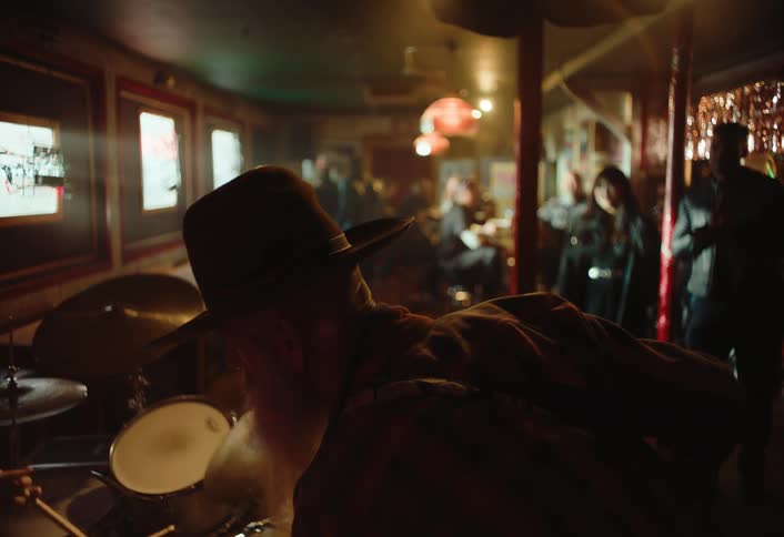 A band is performing in the bar