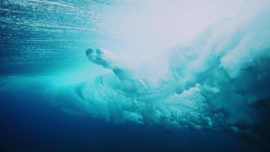 A man is swimming underwater