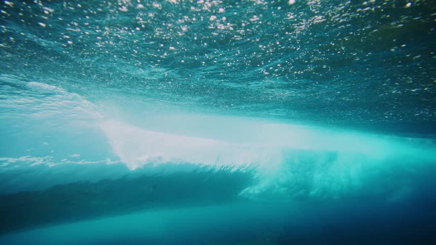 An underwater footage of a person surfing