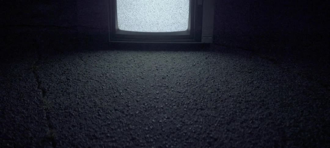 Tv flickering static outside on the pavement