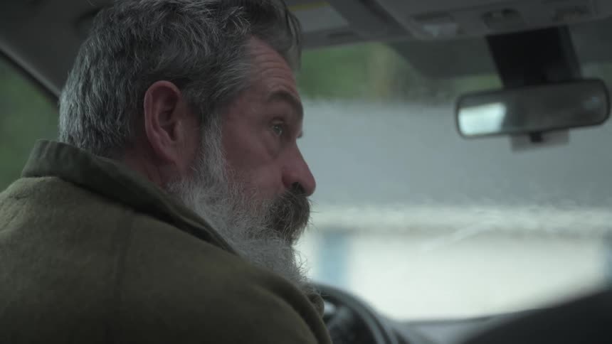 A footage of a person driving a car