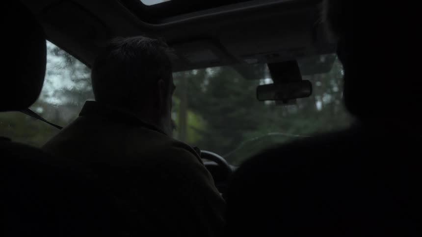 A footage of a person driving a car