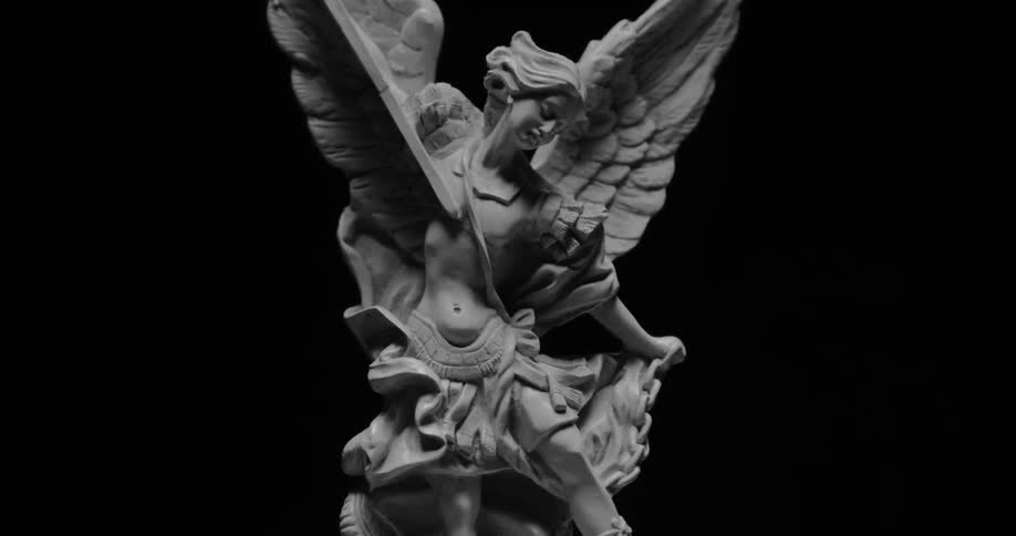 Looking closely at a statue of a winged woman