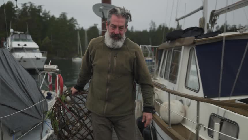Man walking with a fishing tackle