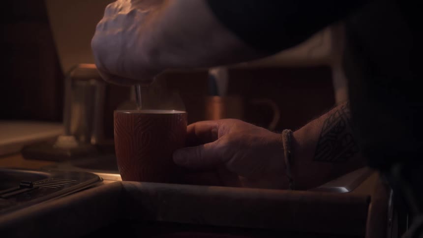 A footage of a man making a coffee